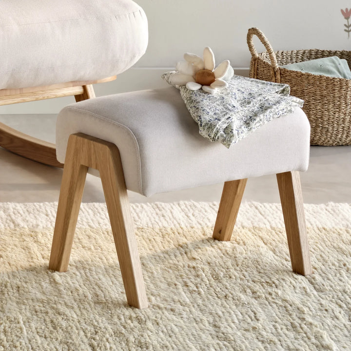 Close up of Hera barley footstool in a nursery setting.