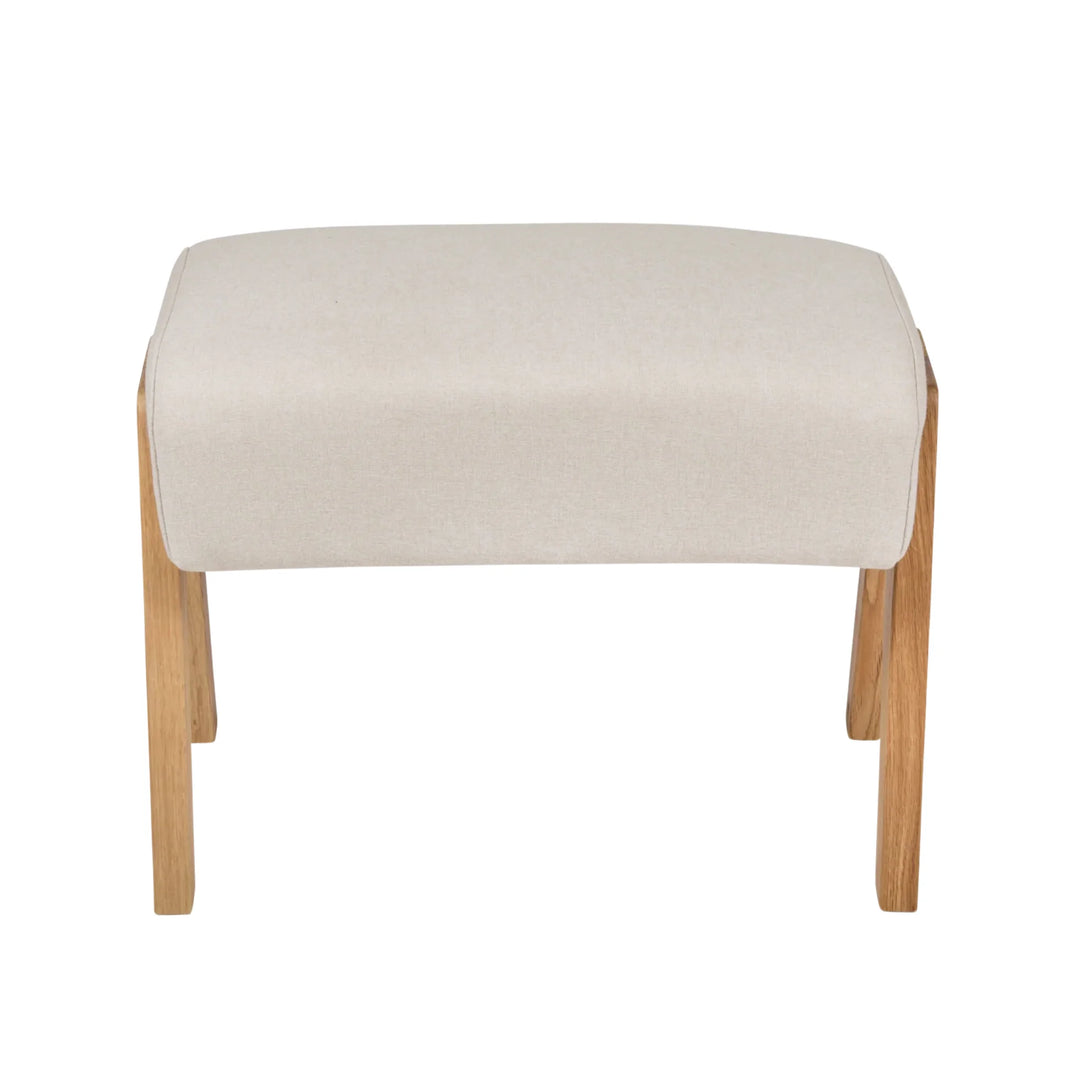 Front on shot of the Hera Footstool in Barley.