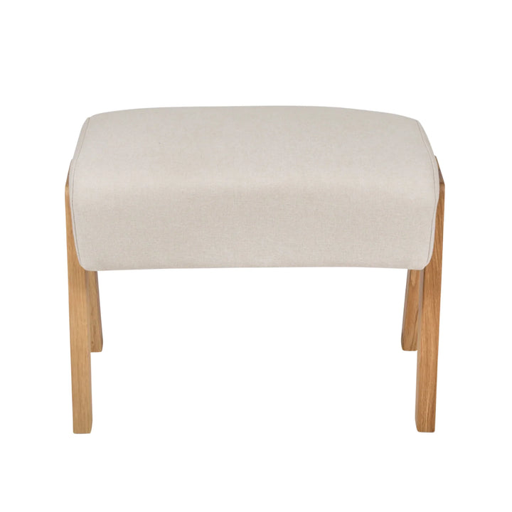 Front on shot of the Hera Footstool in Barley.
