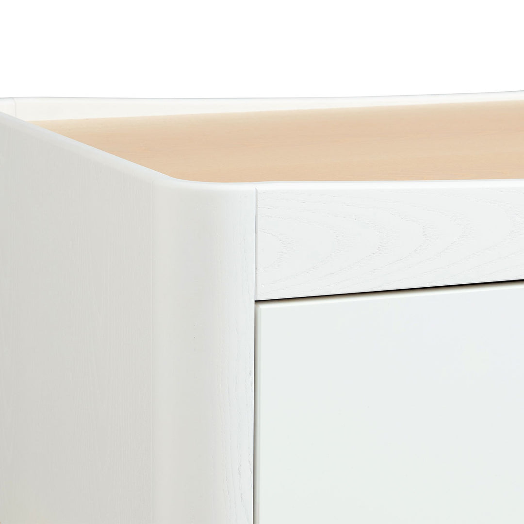 close up of the top corner of the Gaia Baby Hera Dresser Scandi White and Natural