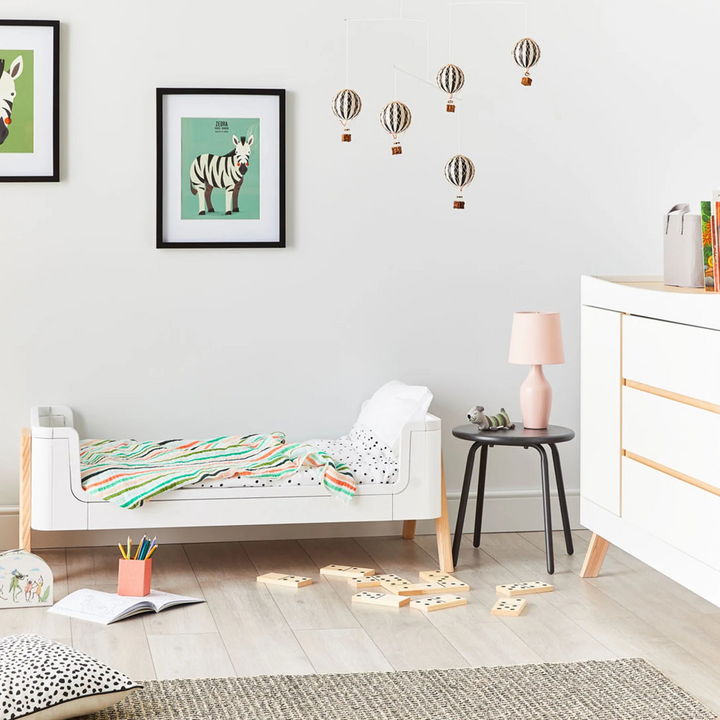 Lifestyle image of the Hera Cot Bed FIrst Bed