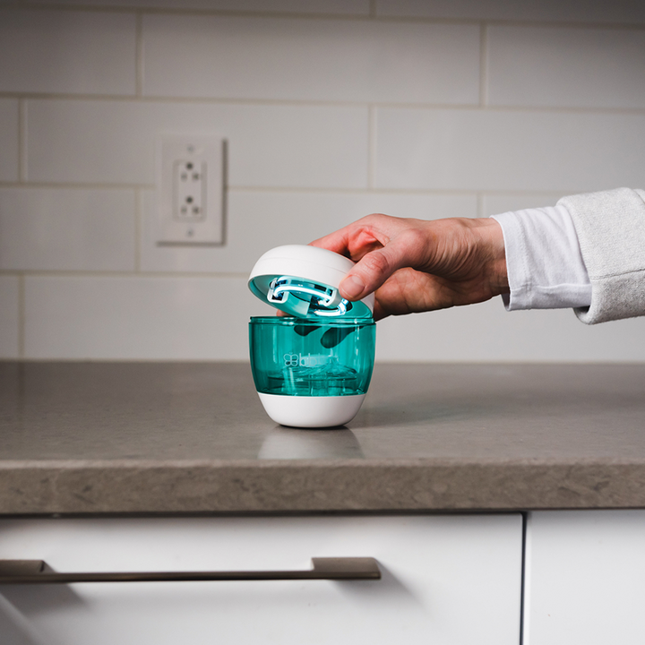 BBLuv Uvi Portable Steraliser on the kitchen counter steralising a soother.