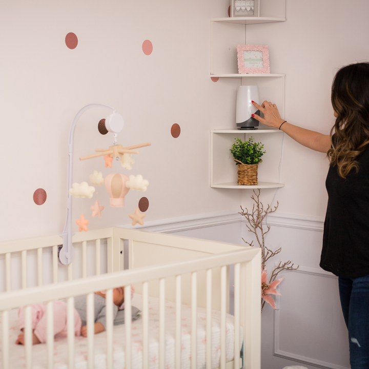 BBLuv Pure 3-in-1 air purifier with HEPA filter displayed on a shelving in the corner of a nursery