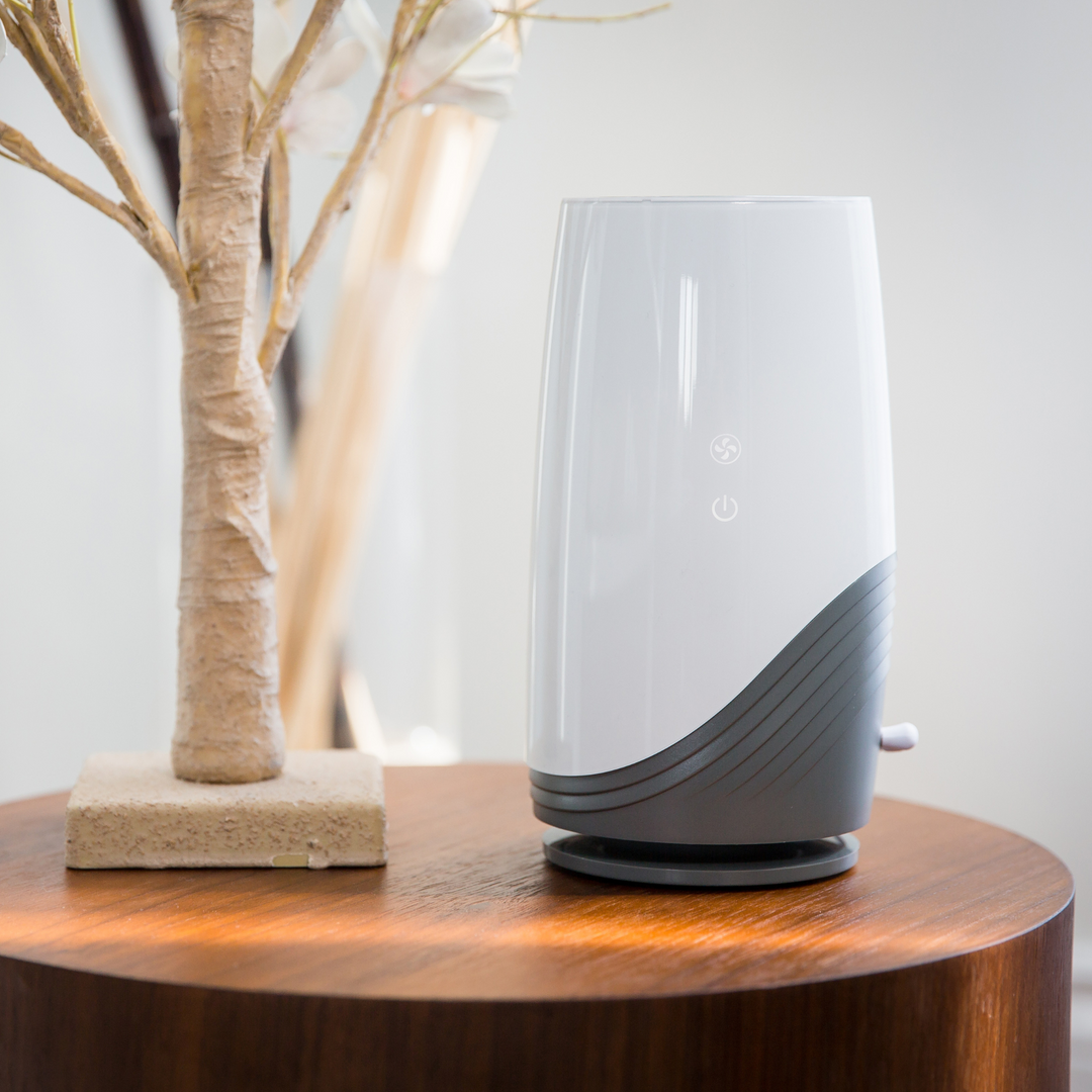 BBLuv Pure 3-in-1 air purifier with HEPA filter displayed on a side table