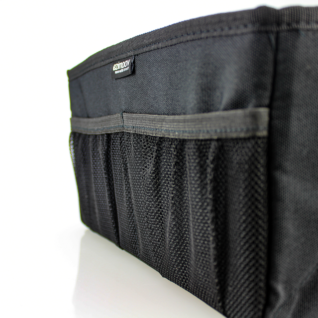 This image shows a close up of the side mesh elastic pockets on the caddy.