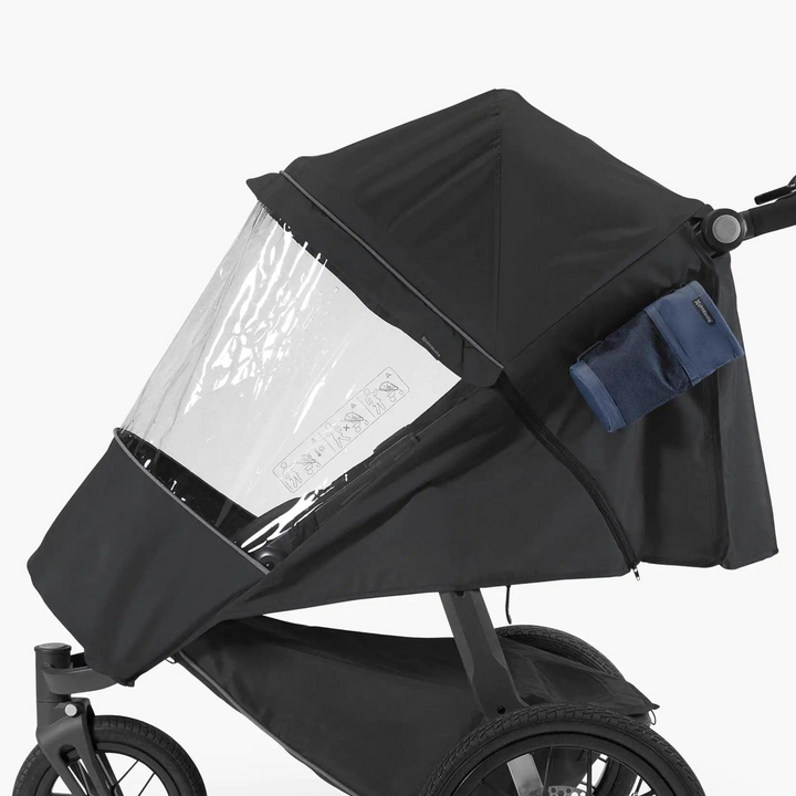 This is a side shot of the UPPAbaby Ridge Performance Rain Cover on the Ridge Stroller in the Reggie fashion