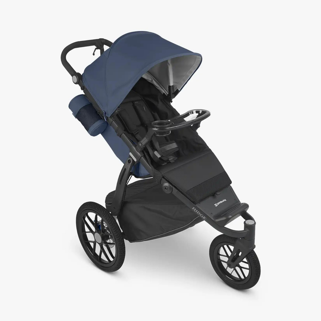 This is a picture of the Ridge stroller in Reggie with the snack tray attached