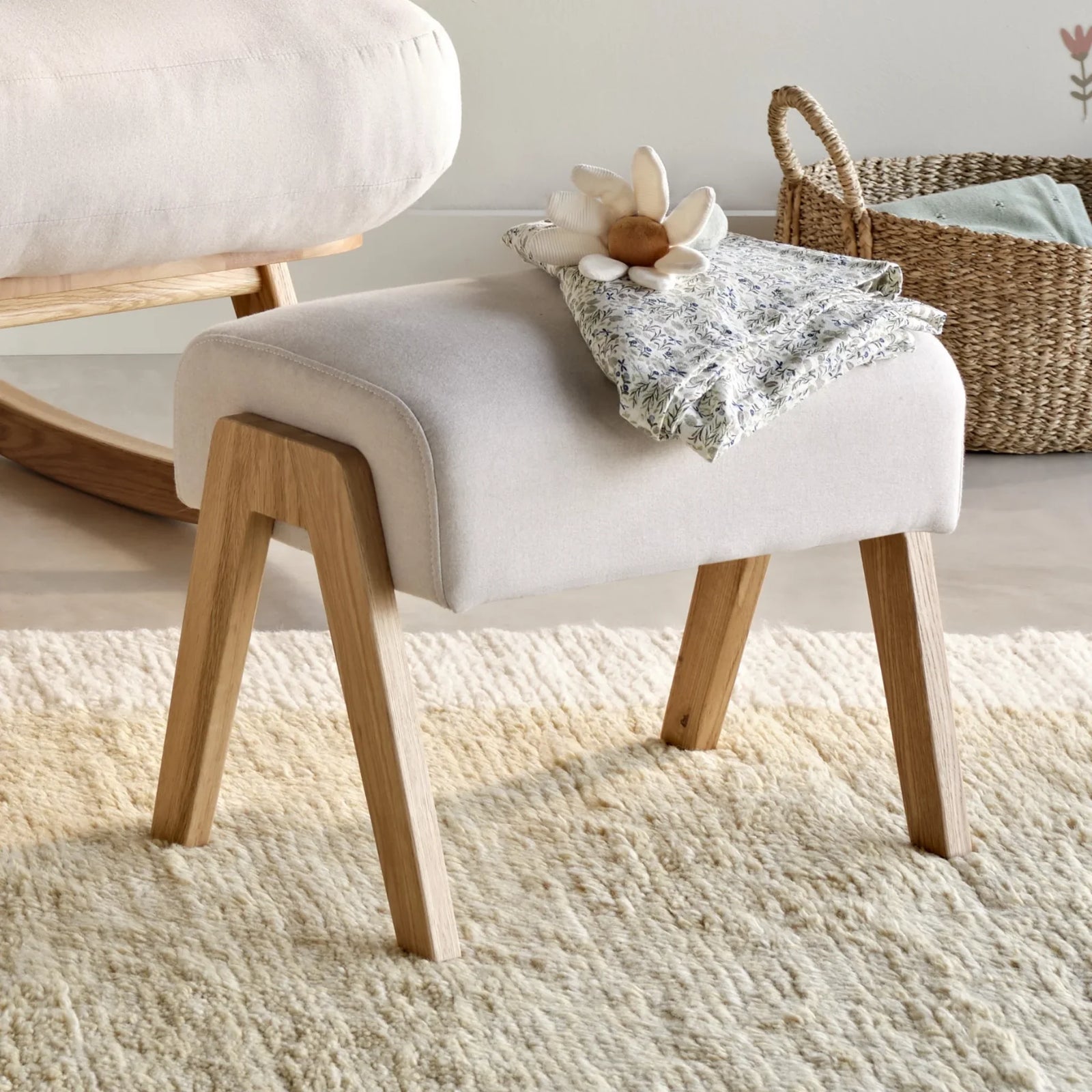 Close up of Hera barley footstool in a nursery setting.