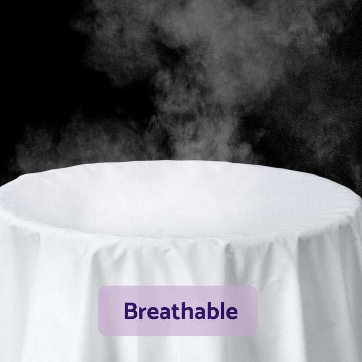 Steam rising through the ClevaMama brushed cotton waterproof mattress protector, demonstrating its breathable, temperature-regulating fabric for baby mattresses.