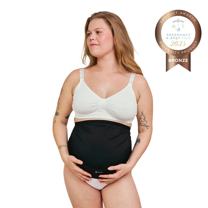 Carriwell adjustable maternity support belt in black, worn under the bump to provide pregnancy back, pelvic and abdominal support, award-winning maternity belt designed to relieve discomfort and support growing baby bump.