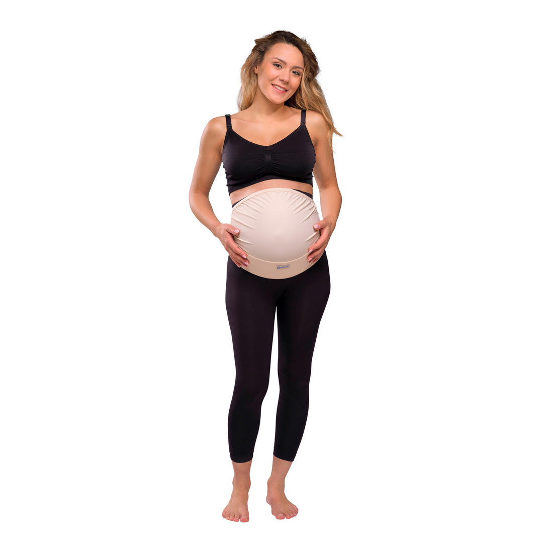 This is an image of a pregnant model wearing the Honey colour of the maternity support belt.