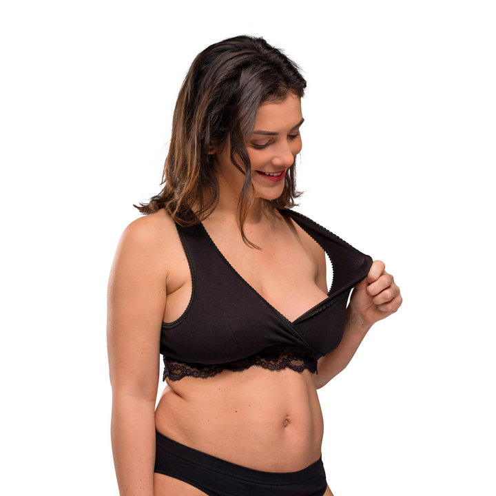 This image shows the stretchiness of the fabric of the bra to make breastfeeding during the night a breeze.