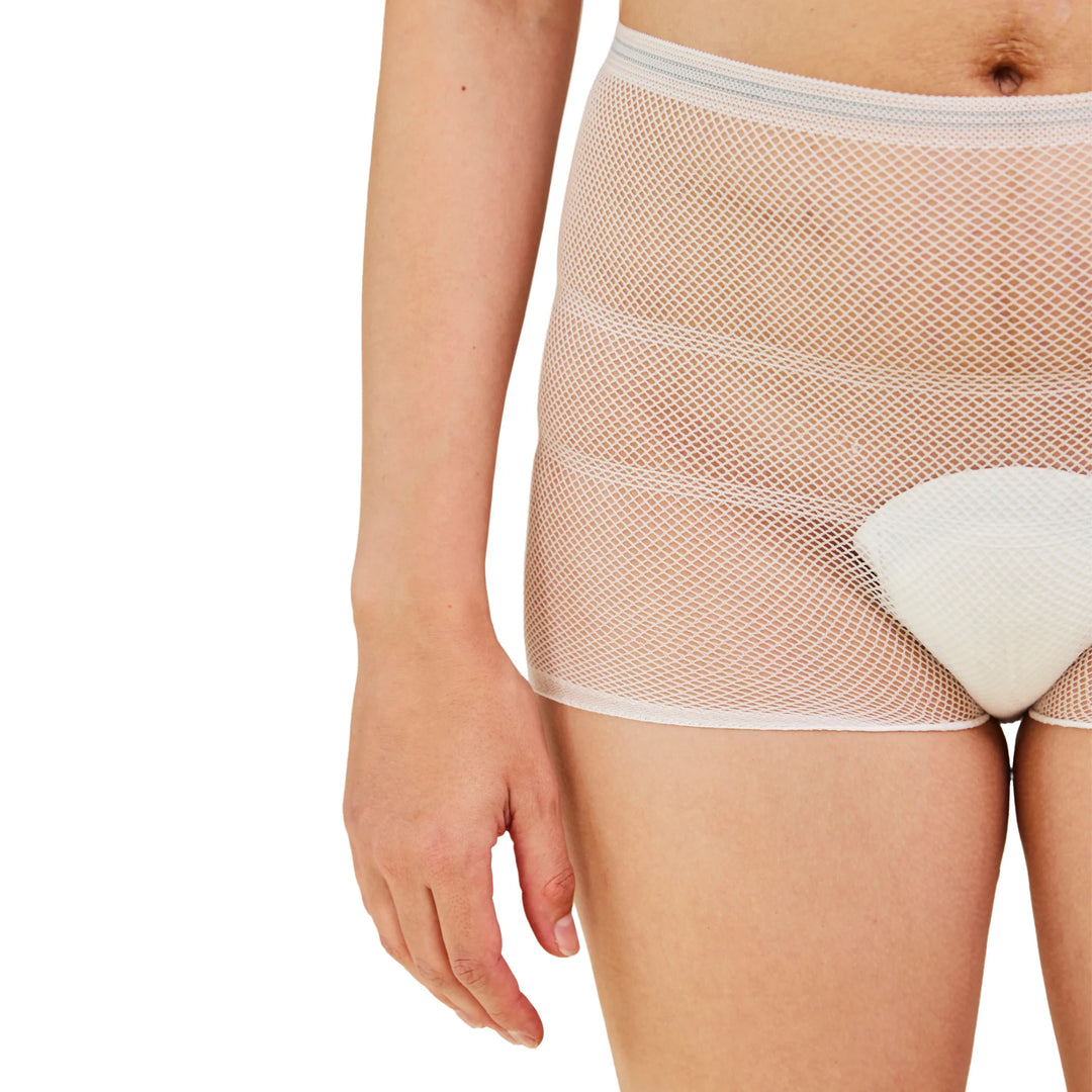 Close-up of Carriwell hospital pants showing soft breathable white mesh maternity underwear with secure pad support for postnatal recovery after birth.