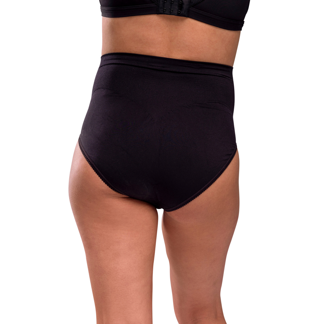 This image shows the back of the Carriwell maternity support pants on a model.