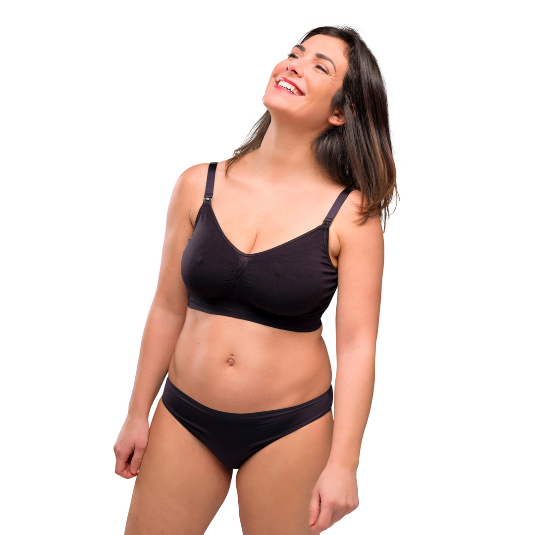 This is an image of the Carriwell Organic Cotton Maternity and Nursing Bra on a smiling model.