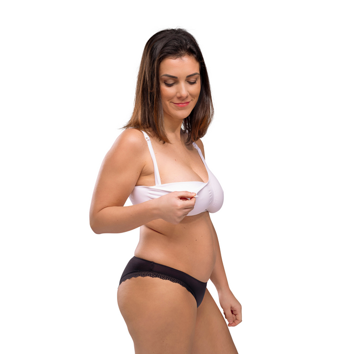 This image shows the Carriwell Organic Cotton Maternity Nursing Bra on a model with the clasp being open for easy feeding.