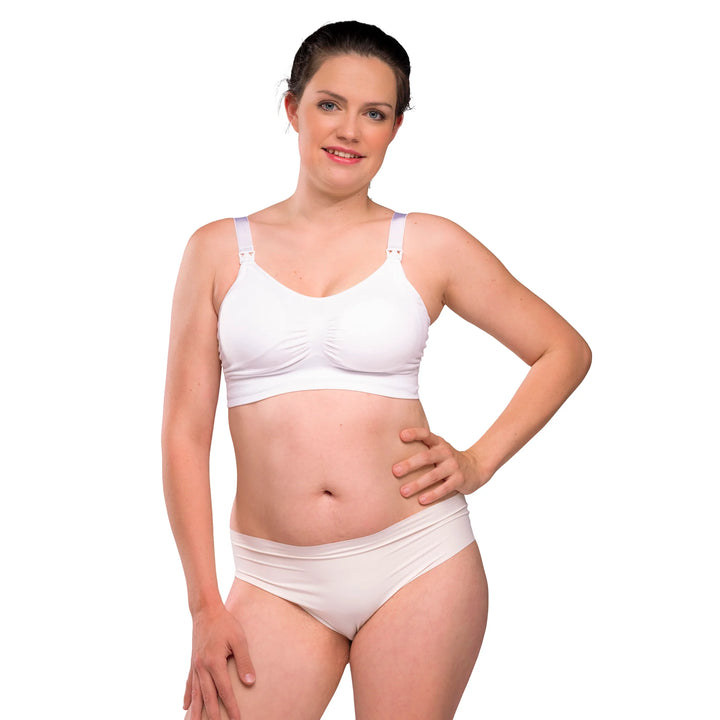 Woman wearing white padded carriwell feeding bra.