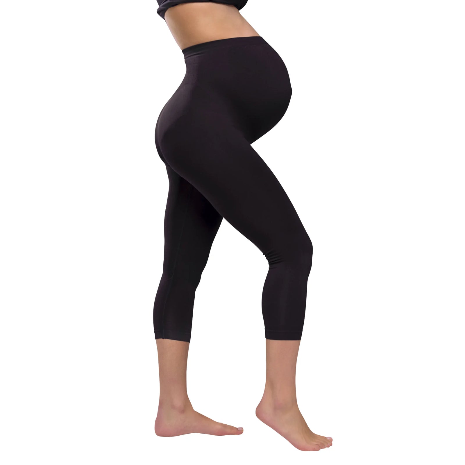Carriwell three-quarter length maternity support leggings in black, worn by pregnant model, featuring stretchy breathable fabric and gentle belly support for comfort during pregnancy.