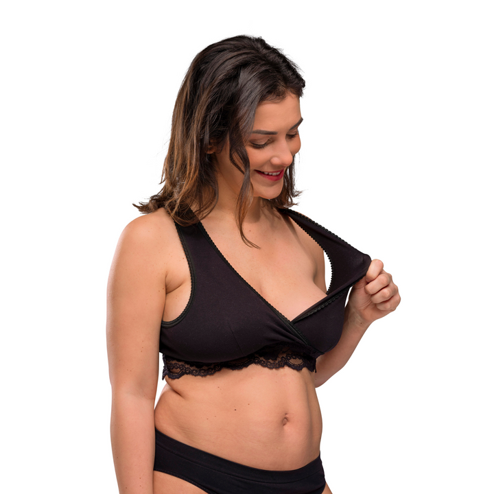 Carriwell Crossover Sleeping and Nursing Bra in black on a model showing the stretchiness of the material