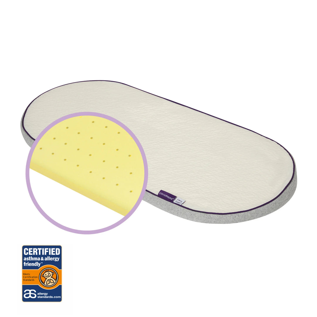 Oval ClevaFoam Moses Basket Mattress on a white background with a circular cutaway highlighting the yellow ventilated foam interior. An asthma and allergy friendly® certification badge is shown below.