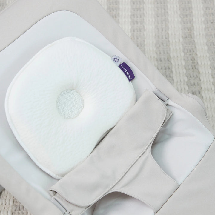 ClevaMama ClevaFoam Baby Head Pillow in infant bouncer – breathable memory foam newborn pillow for flat head prevention, providing ergonomic neck and head support for babies.