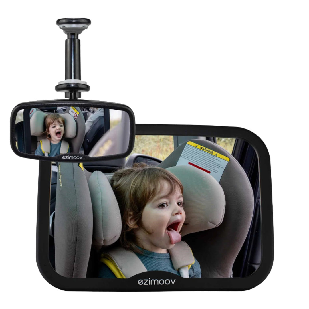 EziMoov clip-on rear-view baby mirror pack showing a toddler in a rear-facing car seat making a funny face, displayed in both the large backseat mirror and the smaller clip-on mirror.