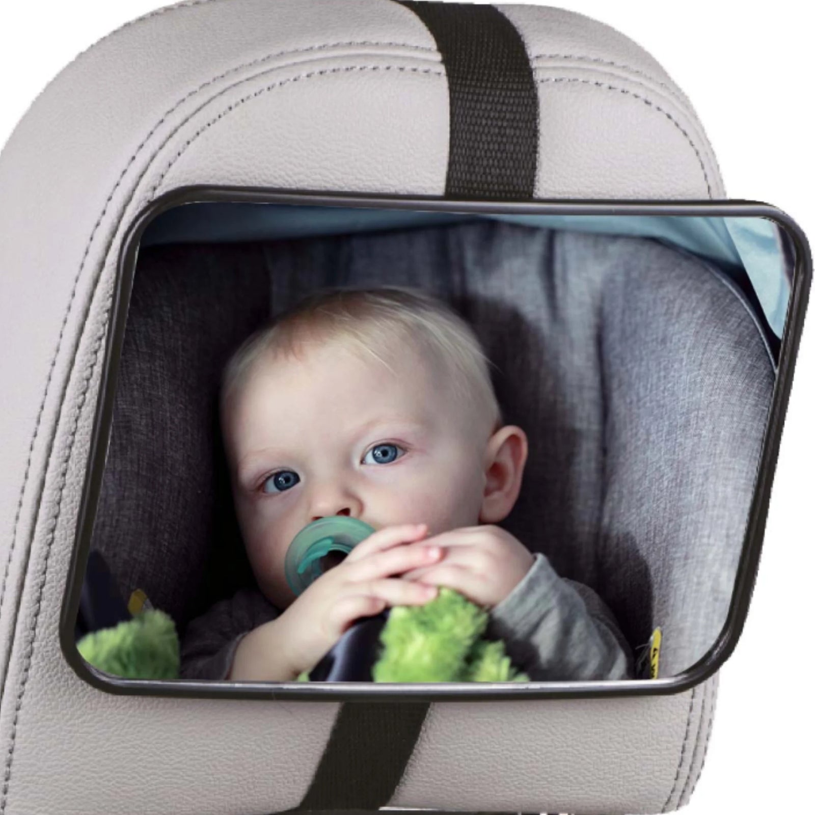 Rear-facing baby car seat mirror showing a baby safely seated in a grey car seat, holding a pacifier and soft toy, reflected clearly for parent visibility. EziMoov rear-facing car seat mirror product image.