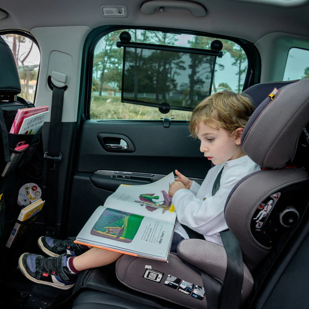 This image shows the sun shade in use on a car window