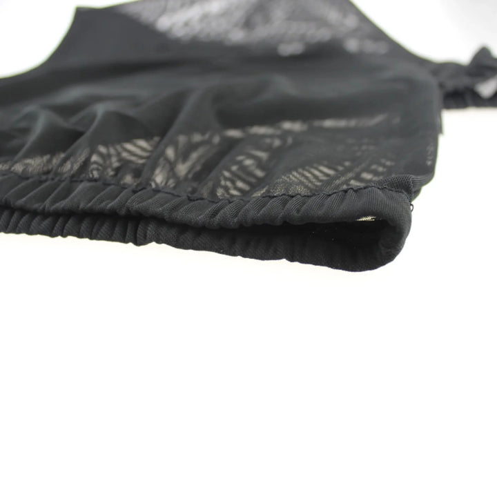 Close-up of the elastic edge on the EziMoov car window sun sock shade, showing the stretch-fit mesh fabric and reinforced stitching designed for secure fit, UV protection, and breathable coverage on vehicle windows.