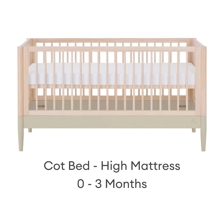 Gaia Baby Eos convertible cot in natural desert sage finish with mattress in high newborn position for 0–3 months on a white background.