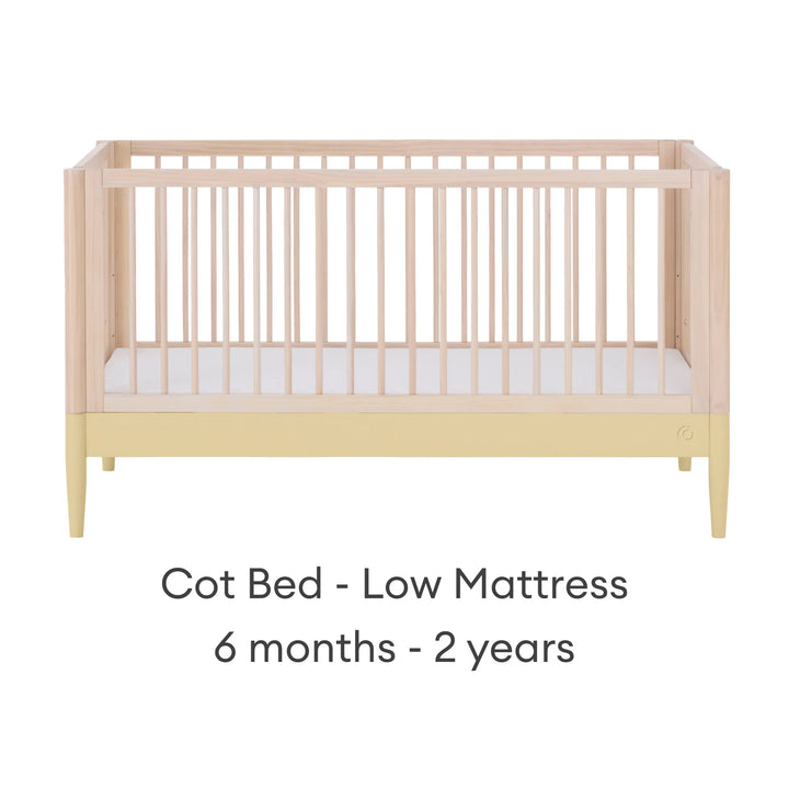 Gaia Baby Eos convertible cot bed in natural wood and yellow with low mattress setting for baby and toddler (6 months–2 years)