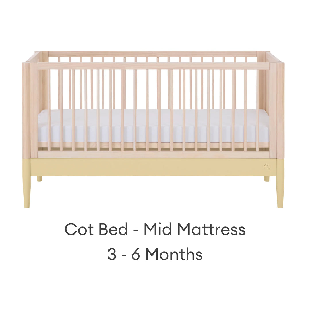 Gaia Baby Eos convertible cot bed in natural wood and yellow with mid mattress setting for baby (3–6 months)