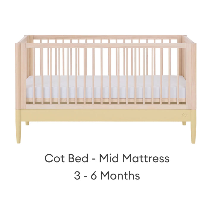 Gaia Baby Eos convertible cot bed in natural wood and yellow with mid mattress setting for baby (3–6 months)