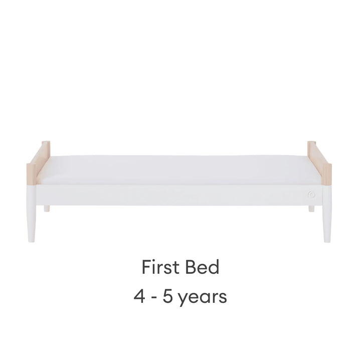 Convertible baby cot transformed into first bed for ages 4–5 years in natural wood and white finish