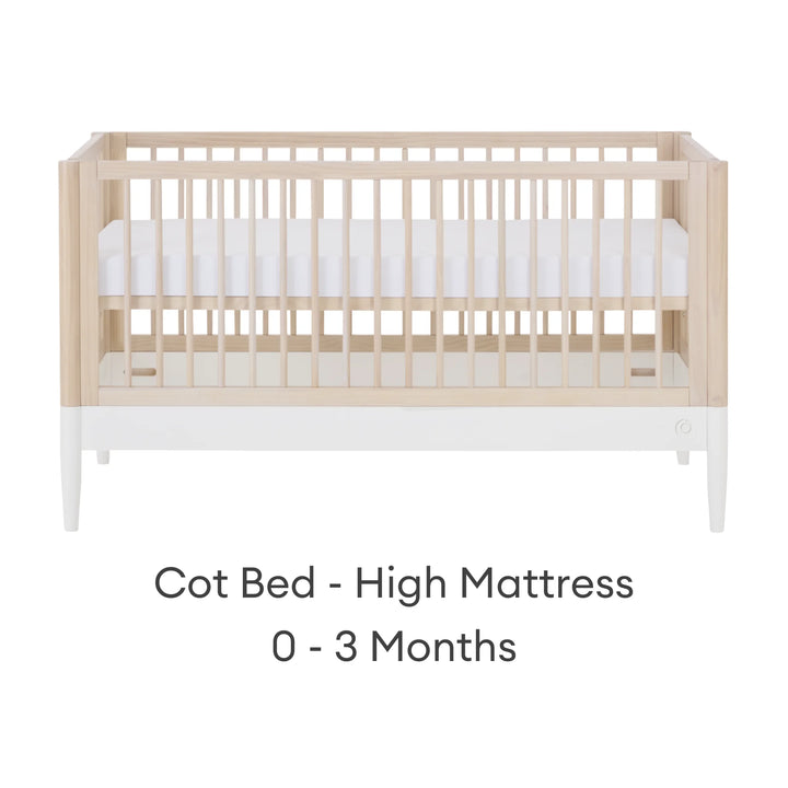 Gaia Baby Eos convertible cot bed in natural wood and white with high mattress setting for newborn (0–3 months)