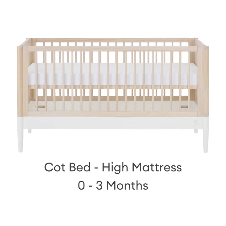 Gaia Baby Eos cot bed with high mattress position for 0–3 months in natural wood and white finish