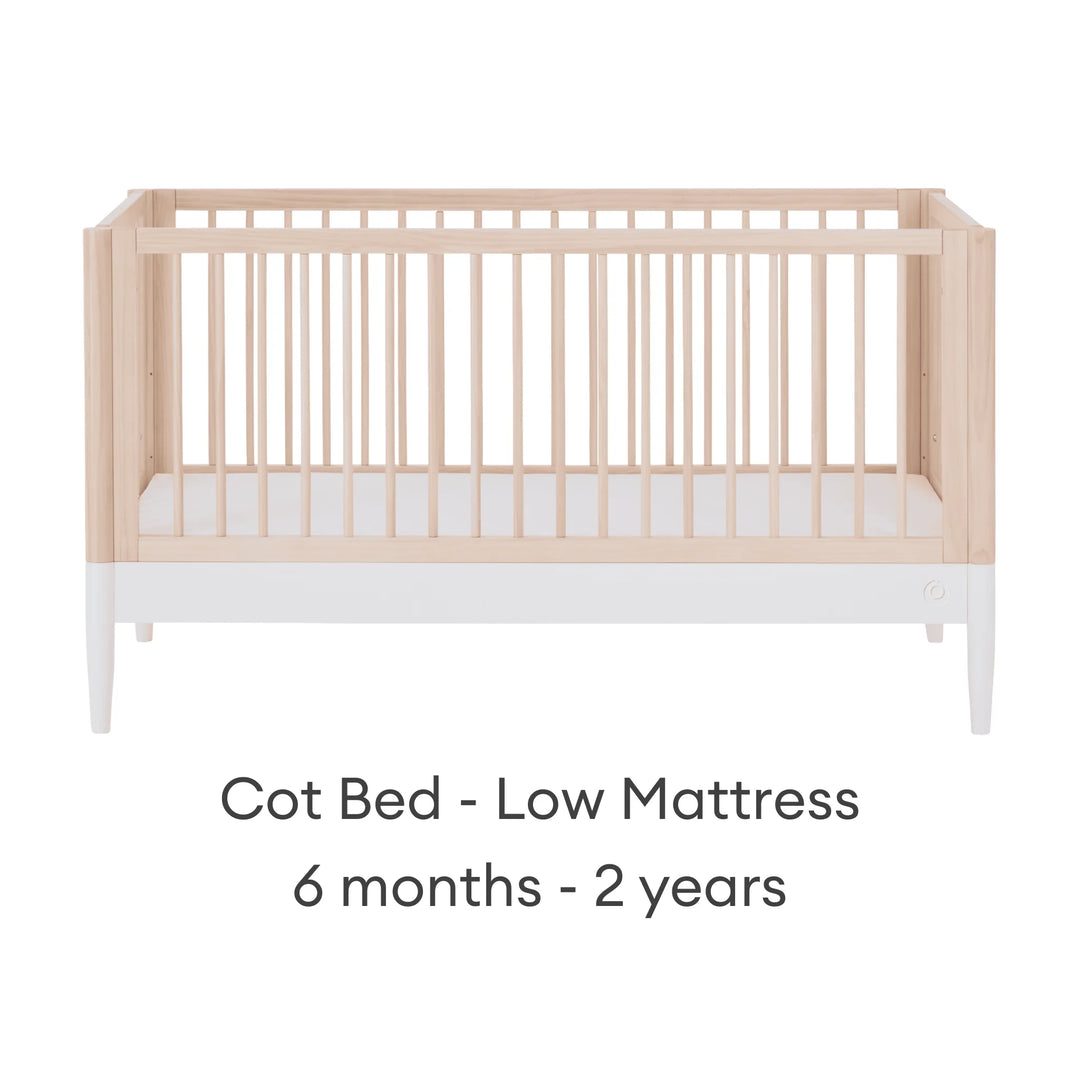 Gaia Baby Eos convertible cot bed in natural wood and white with low mattress setting for baby and toddler (6 months–2 years)