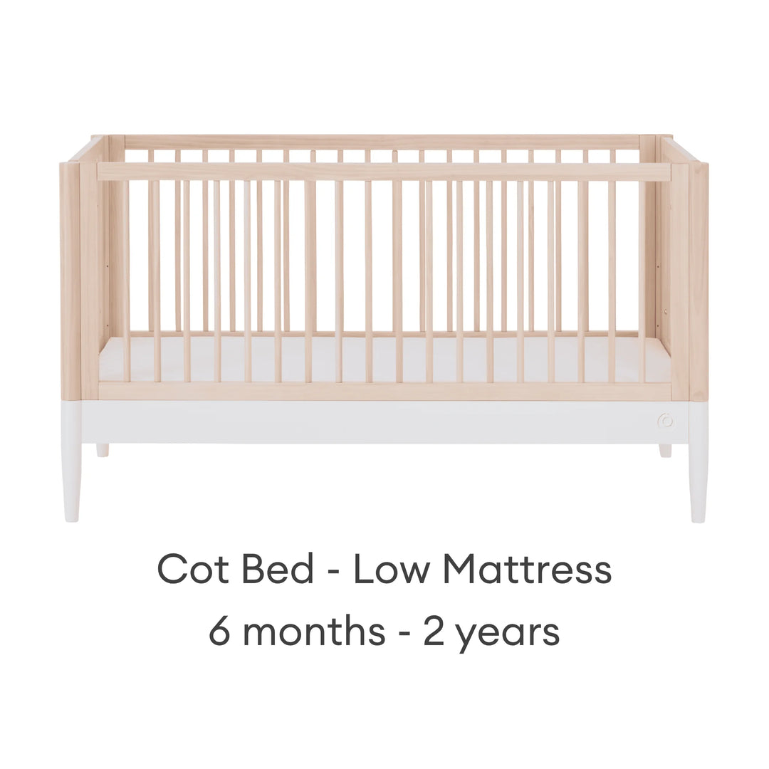 Gaia Baby Eos cot bed with low mattress position for 6 months to 2 years in natural wood and white finish