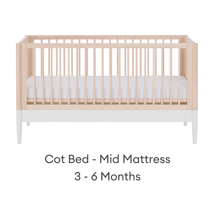Convertible baby cot with mid mattress setting for 3–6 months in natural wood and white