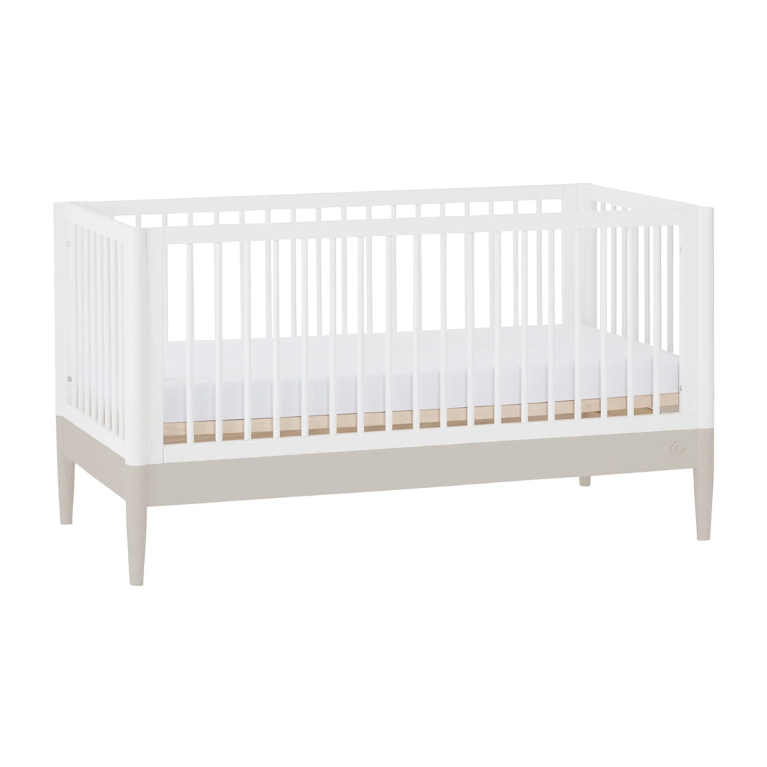 Gaia Baby Eos convertible cot bed white and cashmere modern wooden baby crib with slatted sides and raised legs nursery furniture