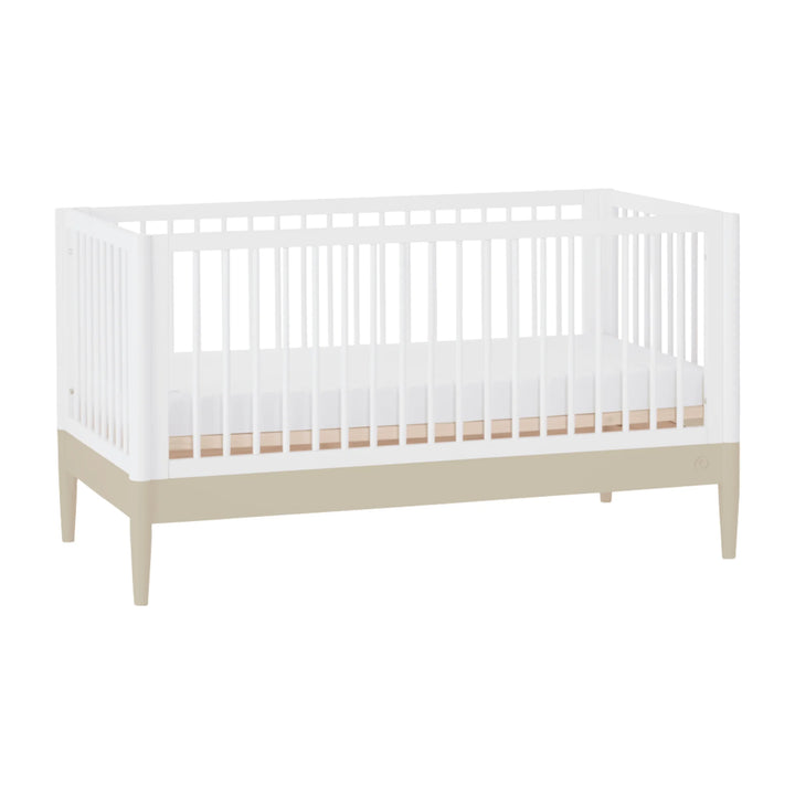 Gaia Baby Eos convertible cot bed white and cashmere angled view modern wooden baby crib with slatted sides and elevated legs