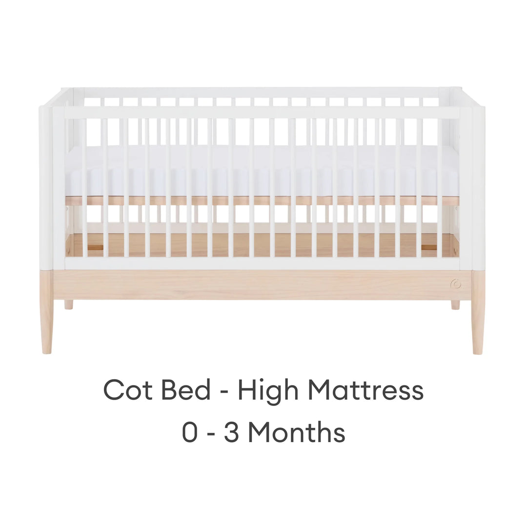 Gaia Baby Eos convertible cot bed white and natural wood high mattress setting for newborn 0 to 3 months adjustable baby crib front view