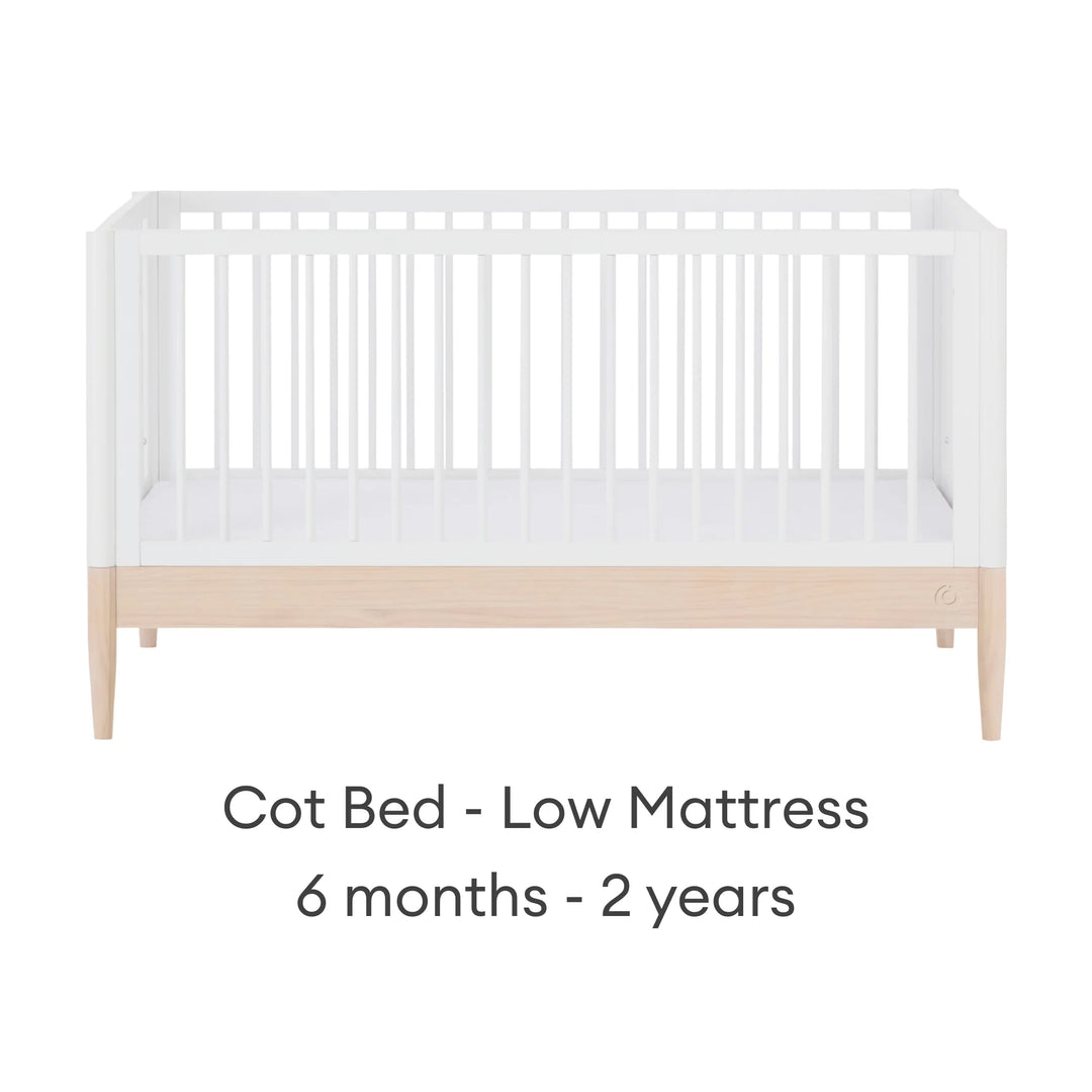 Gaia Baby Eos convertible cot bed white and natural wood low mattress setting for baby 6 months to 2 years adjustable cot bed front view