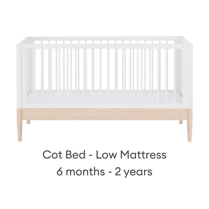 Gaia Baby Eos convertible cot bed white and natural wood low mattress setting for baby 6 months to 2 years adjustable cot bed front view