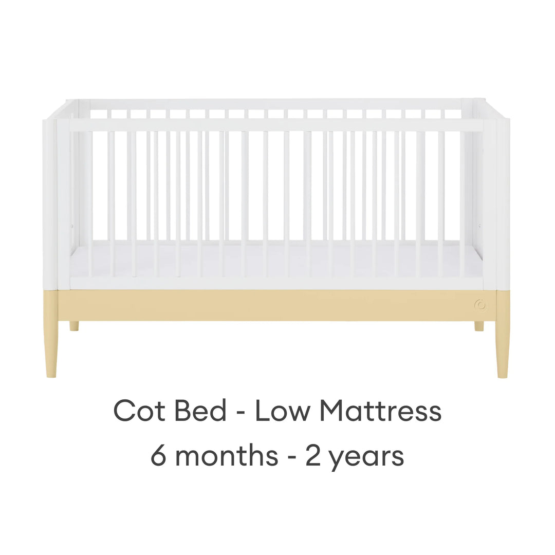 Gaia Baby Eos cot bed in white and yellow with low mattress setting for baby 6 months to 2 years on a white background