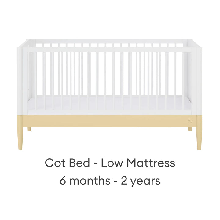 Gaia Baby Eos cot bed in white and yellow with low mattress setting for baby 6 months to 2 years on a white background