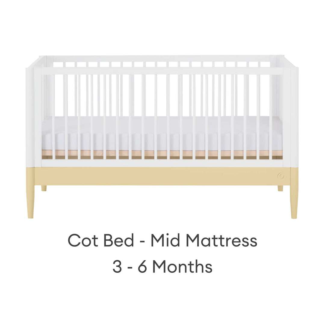 Gaia Baby Eos cot bed in white and yellow with mid mattress setting for baby 3–6 months on a white background
