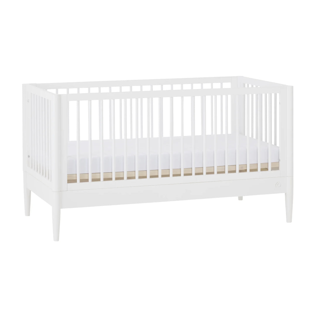 Gaia Baby Eos convertible cot bed in white, angled view on a white background