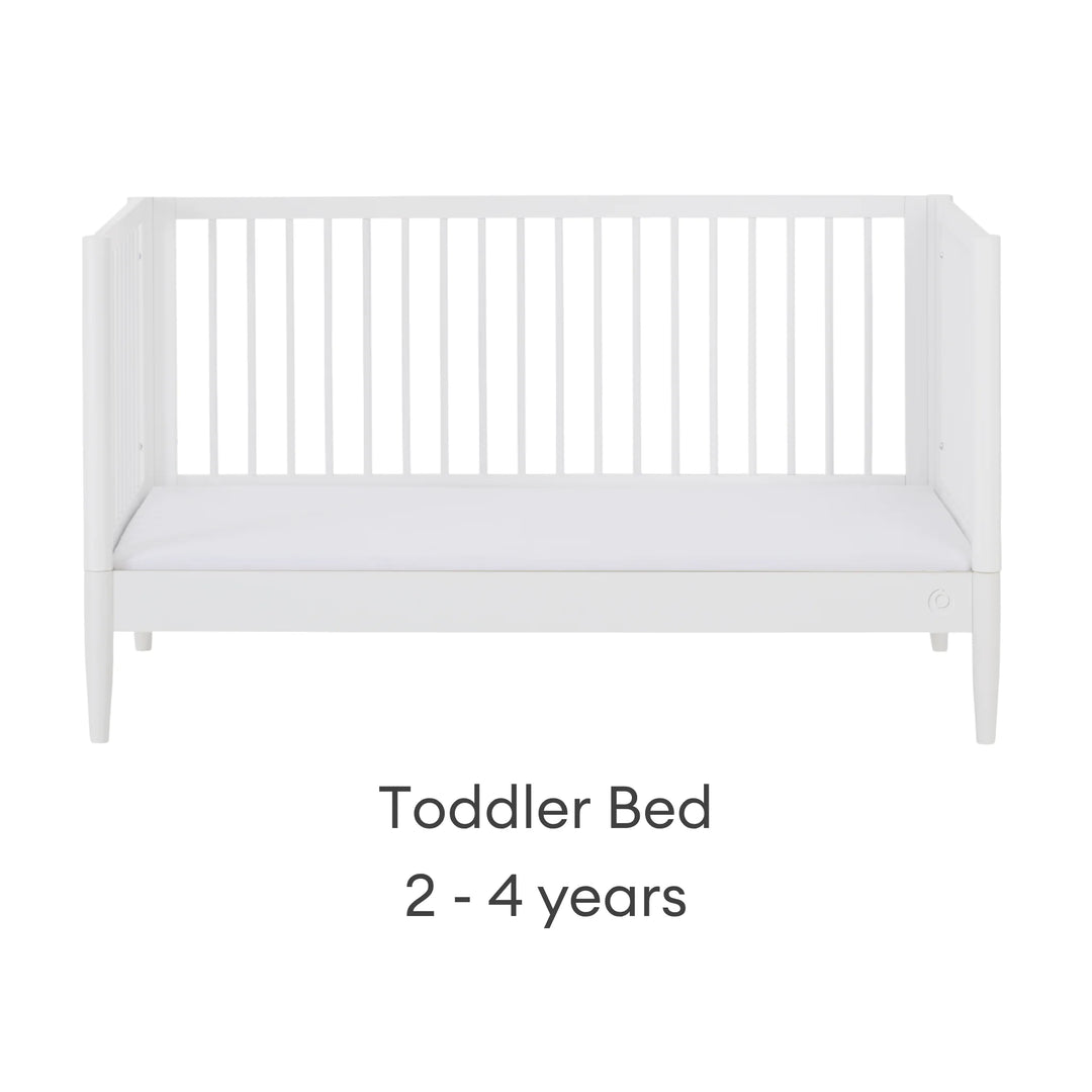 Gaia Baby Eos convertible cot bed in white configured as a toddler bed for ages 2–4 years on a white background