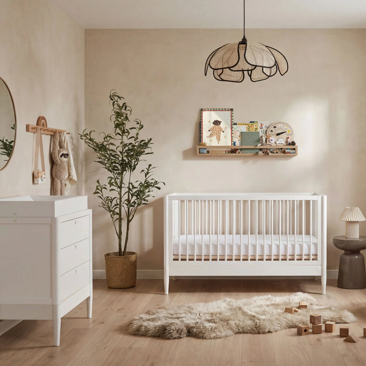 Gaia Baby Eos white cot bed and dresser nursery furniture set in a modern neutral baby room